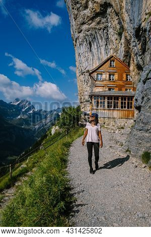 Swiss Alps And A Mountain Restaurant Under The Aescher Cliff Viewed From Mountain Ebenalp In The App
