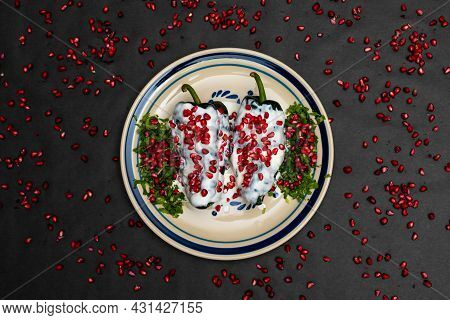 Chile En Nogada, A Traditional Dish From Puebla With The Addition Of Walnut Cream, Pomegranate Seeds