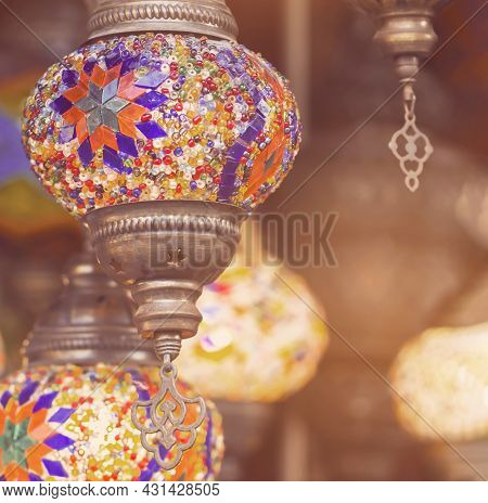 Middle Eastern Lambas Of Different Colors And Sizes Are Hanging In The Bazaar. Bright Traditional Ar