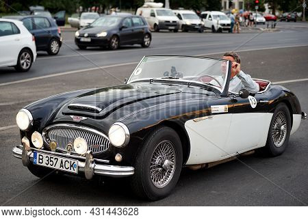 Bucharest, Romania - August 10, 2021: Classic Rally Driver Christian Hiver Is Driving An 1961 Austin