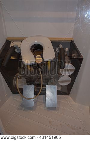 Transinne, Wallonia, Belgium - August 10, 2021: Euro Space Center. Toilet Contraption In Space On Di