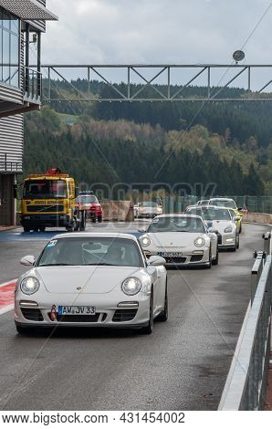 Sport Cars Entering The Pitlane On Race Track During Track Day In October, 2014 At Circuit De Spa-fr