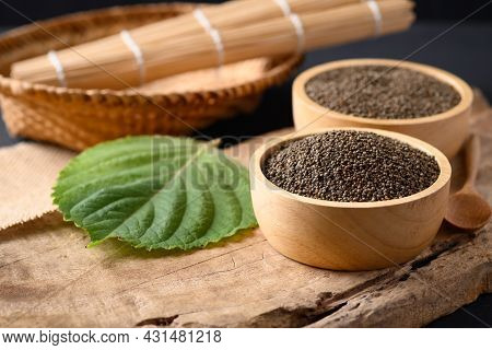 Perilla Seeds In A Bowl On Wooden Background, Healthy Herbal Seed Ingredients In Asian Food