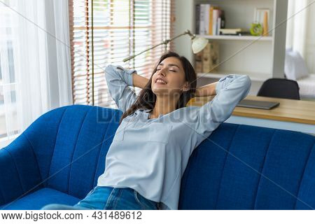 Cacusian Woman Take A Nap During The Daytime To Rest Their Eyes From Hard Work. Woman Relaxing On So