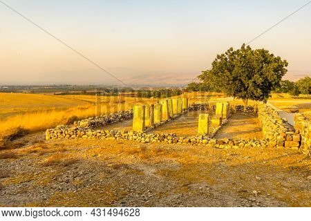 Sunset View Of Ancient Israelite Buildings Remains, With Trees And Landscape, In Tel Hazor National 