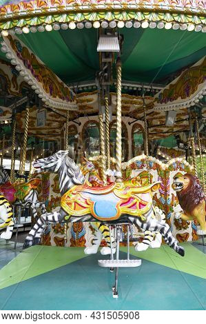 London, U.k., July 22,2021: Carousel Horse, Having Fun, Merry Go Ride At London Zoopark