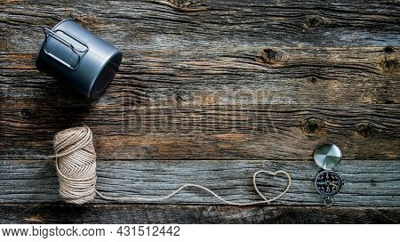 Rustic wooden extured background withy campers accespries
