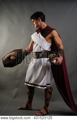 The Sexy Warrior Poses For The Photo.