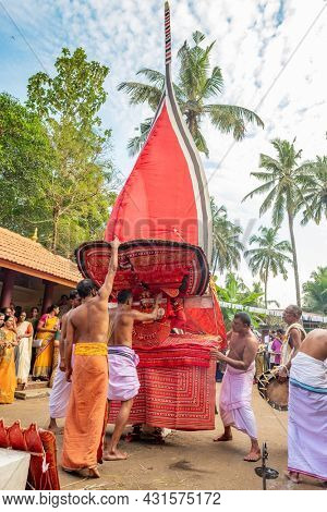 Payyanur, India - December 5, 2019: Theyyam perform during temple festival in Payyanur, Kerala, India. Theyyam is a popular ritual form of worship in Kerala, India