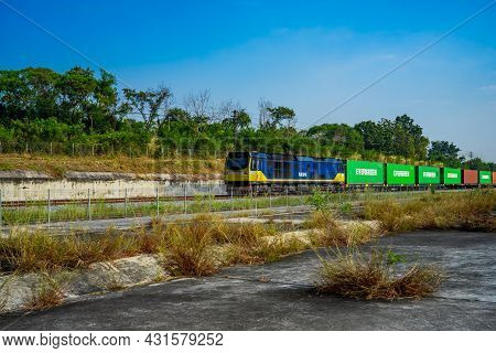 Chonburi Province, Thailand - 21 Nov 2020, The Evergreen Container On The Train Is Driven On Rural R