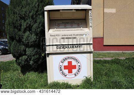 Knurow, Poland - May 11, 2021: Containers For Second-hand Clothes Recycling Operated By Polish Red C