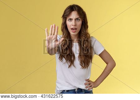 Stop Right There Fashion Police. Serious-looking Confident Young Curly-haired Girl Pull Hand Enough 