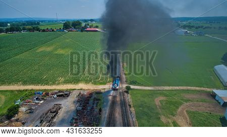 Ronks, Pennsylvania,june 2019 - Aerial Head On View Of Thomas The Tank Engine Approaching Thru Trees