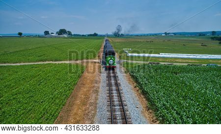 Ronks, Pennsylvania,june 2019 - Aerial Head On View Of Percy The Tank Engine Approaching Thru Trees 