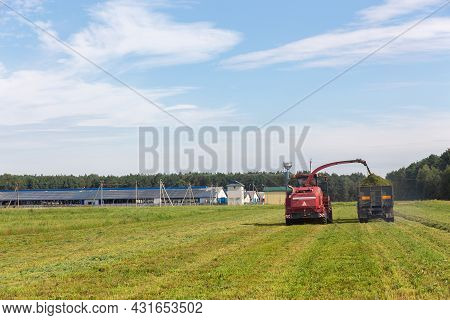 Combine Harvesting A Green Field