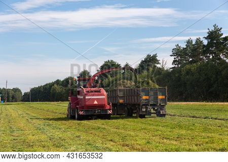 Combine Harvesting A Green Field