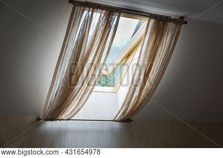 Opened Rooftop Window, View From Room, Transparent Curtains Cover Window. Contemporary And Convinien