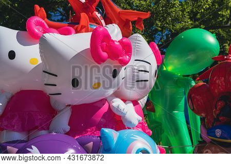 Falcon Heights, Minnesota - August 30, 2021: Plastic Blow Up Hello Kitty Balloon Prizes For Sale At 