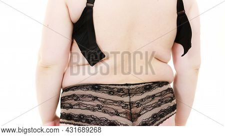 Fat Woman Wearing Black Lingerie Bra And Panties Back View. Plus Size Female Opening Taking Off Or P