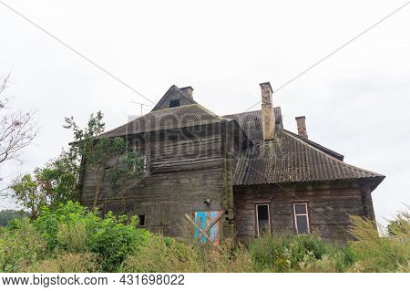An Old Abandoned Three-storey Fully Wooden House