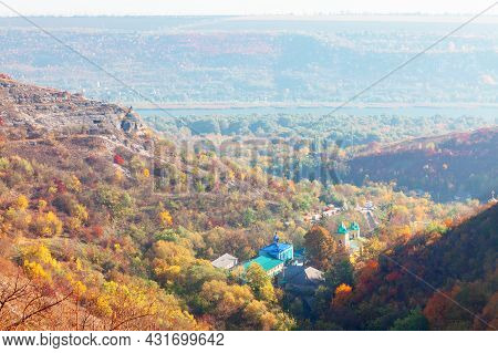 Famous Saharna Monastery In Moldova . Autumn Scenery With Hills And Riverside . Mountainside Church 