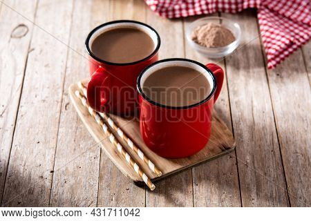 Traditional Mexican Chocolate Atole Drink On Wooden Table