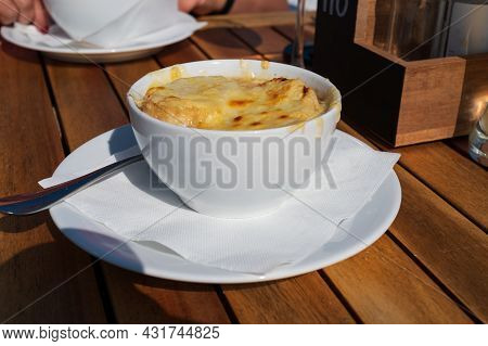 French Caramelized Onion Soup With Croutons And Gruyere Cheesse From Oven