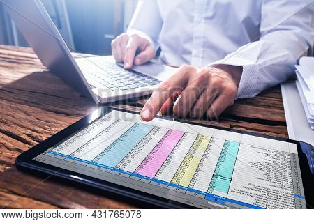 Electronic Spreadsheet On Analyst Computer Using Tablet