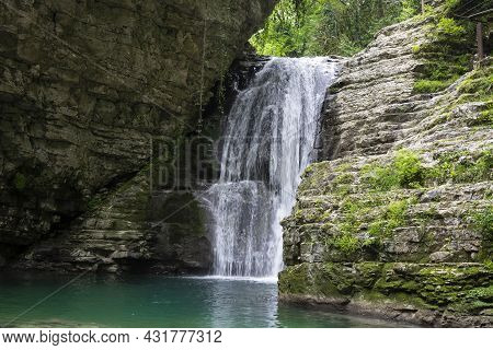 The Olginsky Waterfall In The Republic Of Abkhazia. Cloudy Day On May 21, 2021