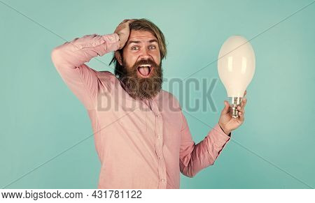 Oh My God. Innovation. Happy Bearded Man Holding Lamp Bulb. Creative Idea. Inspired With New Idea. M