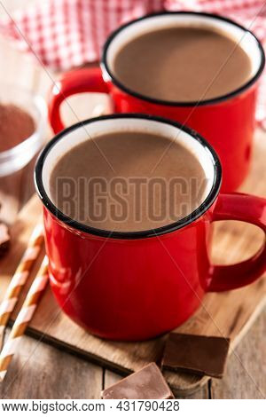 Traditional Mexican Chocolate Atole Drink On Wooden Table