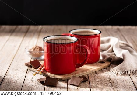 Traditional Mexican Chocolate Atole Drink On Wooden Table