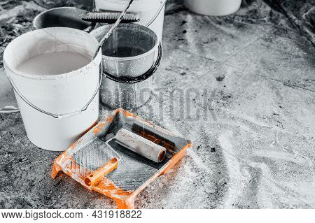 The Concept Of Repair Of The House And Premises. Buckets Of Paint And Lime For Whitewashing And Pain