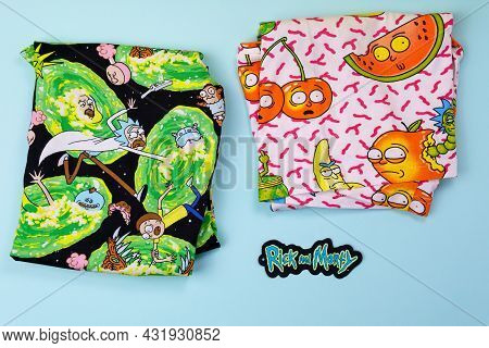 Tyumen, Russia-august 27, 2021: Rick And Morty Multi-colored T-shirt Cartoon Logo. Animated Series C