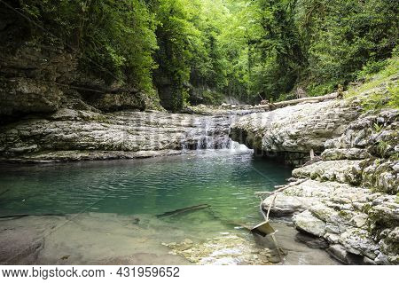 The Olginsky Waterfall In The Republic Of Abkhazia. Cloudy Day On May 21, 2021