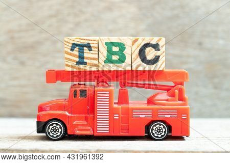 Fire Ladder Truck Hold Letter Block In Word Tbc (abbreviation Of To Be Confirmed Or Continued) On Wo
