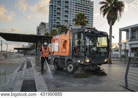 Tel Aviv, Israel - August 17th, 2021: A Street Sweeper At Work, Early Morning, On The Lahat Promenad