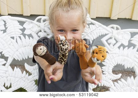 Child With Finger Puppets