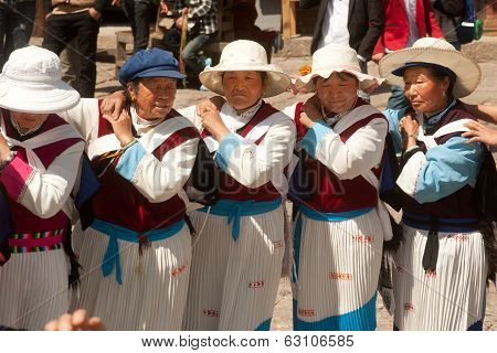 Chinese Naxi Old Woman Performing A Dance.