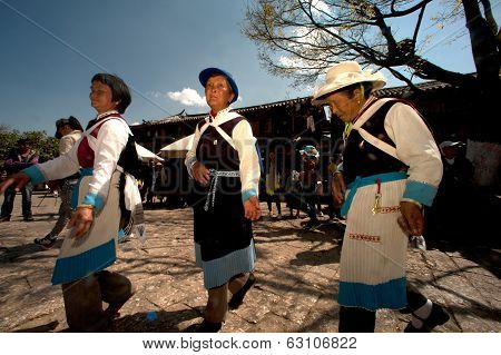 Chinese Naxi Old Woman Performing A Dance.