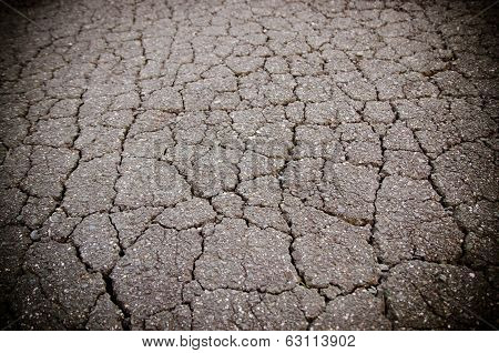 Macro Closeup On Concrete Asphalt Cracks On The Road