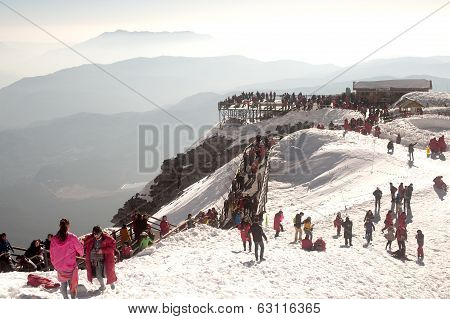 Groups Of Traveler On Wooden Stair Of Jade Dragon Snow Mountain,lijiang,yunnan,southwestern China.