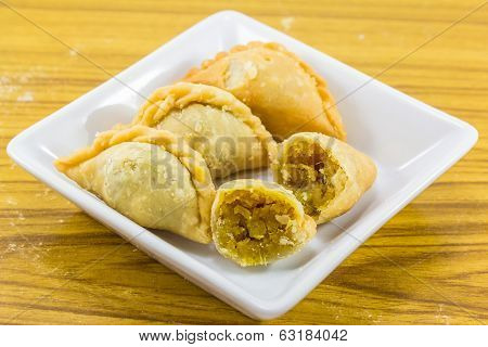 Curry Puffs On White Plate