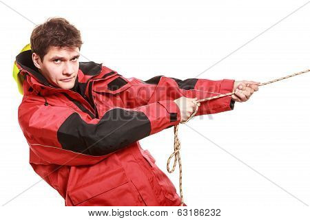 Young Man Sailor In Red Wind Jacket. Sailing.