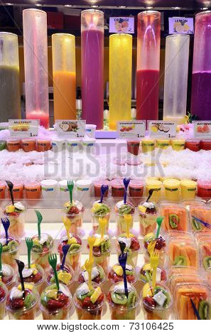 BARCELONA - AUGUST 8: A lot of fruit mousses on a market stall in the Mercat de Sant Josep de la Boqueria in one of the oldest markets in Europe on 8 August 2014 in Barcelona, Spain.
