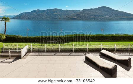 beautiful terrace of a penthouse overlooking the lake, outside