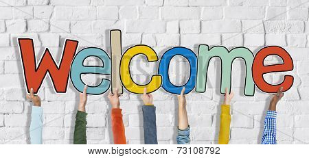 Group of Hands Holding Word Welcome