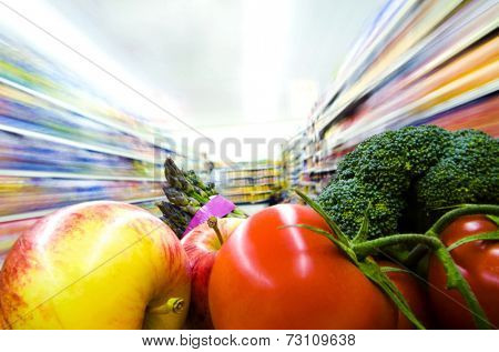 Fresh fruits and vegetables in a supermarket.