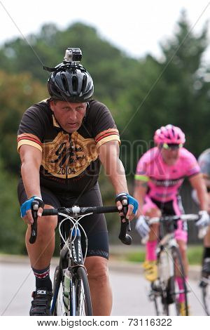 Cyclist Competitor Races Wearing Go Pro Helmet Cam