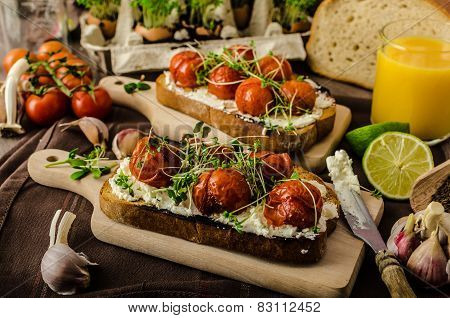 Roasted Cherry Tomato Sauce And Ricotta On Toast